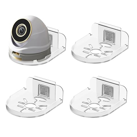 Quatre supports muraux transparents en plastique, dont un portant une petite caméra de surveillance.
