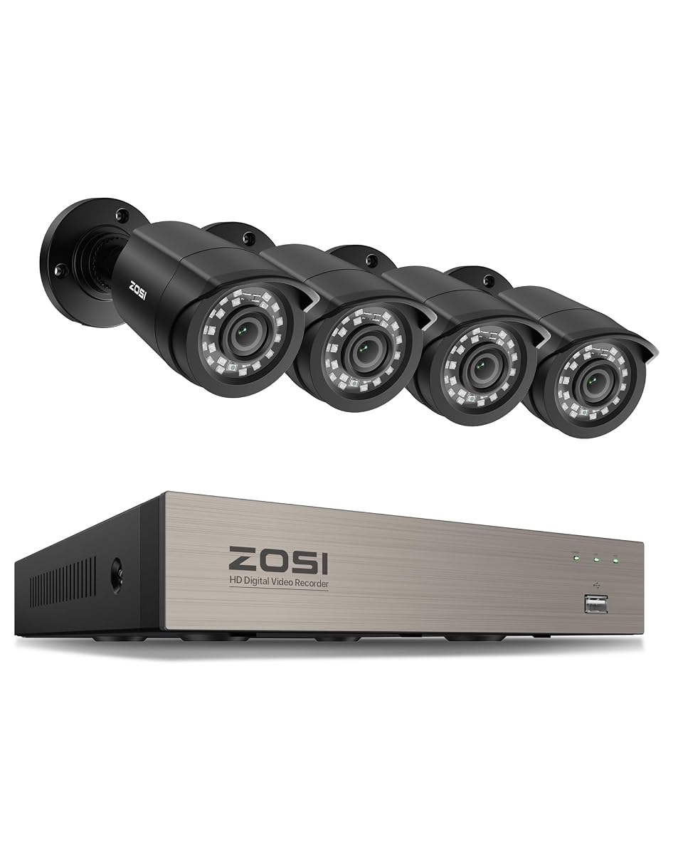 Enregistreur DVR noir avec quatre caméras extérieures, câbles et alimentations près d’une façade en pierre